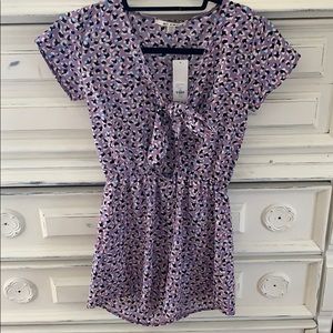Purple leopard print romper with opening in front